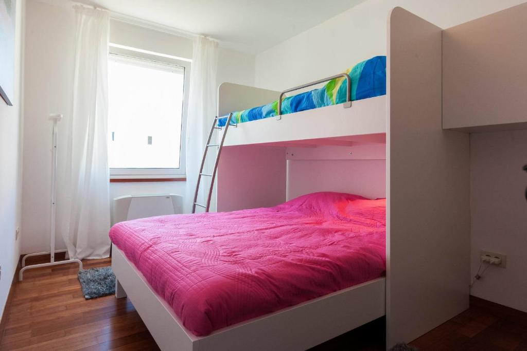 Postel nebo postele na pokoji v ubytování White Towers Residences