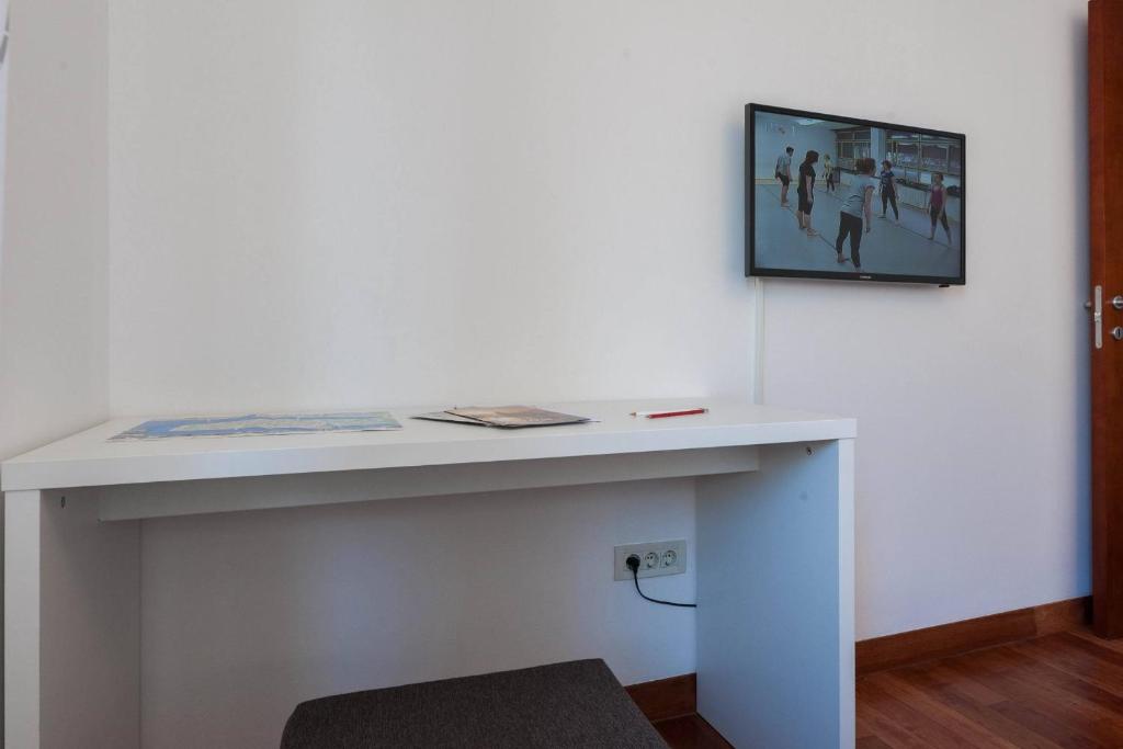 TV a/nebo společenská místnost v ubytování White Towers Residences