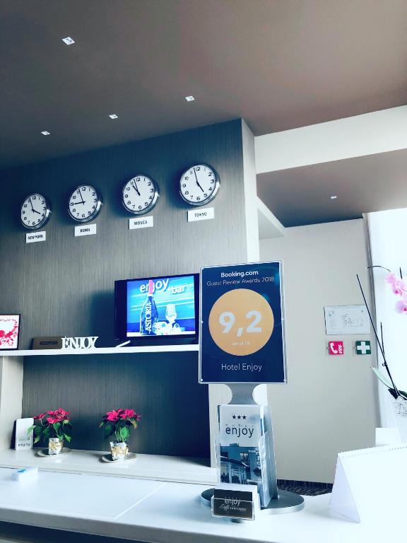 TV a/nebo společenská místnost v ubytování Hotel Enjoy