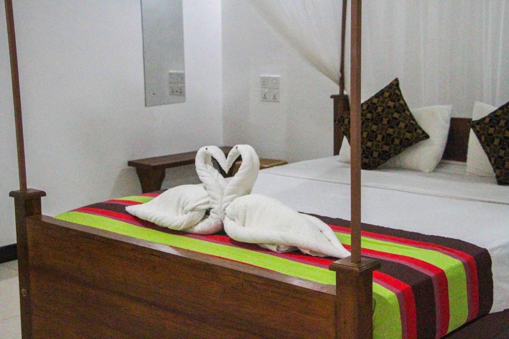 Postel nebo postele na pokoji v ubytování Sigiriya Mana B&B