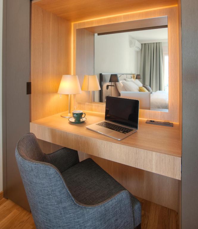 TV i/ili multimedijalni sistem u objektu Fontana Hotel & Gastronomy