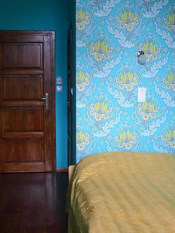 Postel nebo postele na pokoji v ubytování Angel Hostel