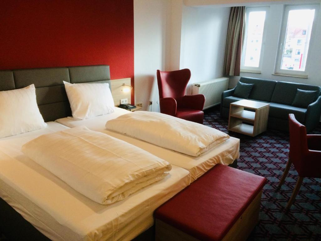 Postel nebo postele na pokoji v ubytování Adesso Hotel Göttingen - pay at property on arrival-Ihr Automatenhotel in Göttingen
