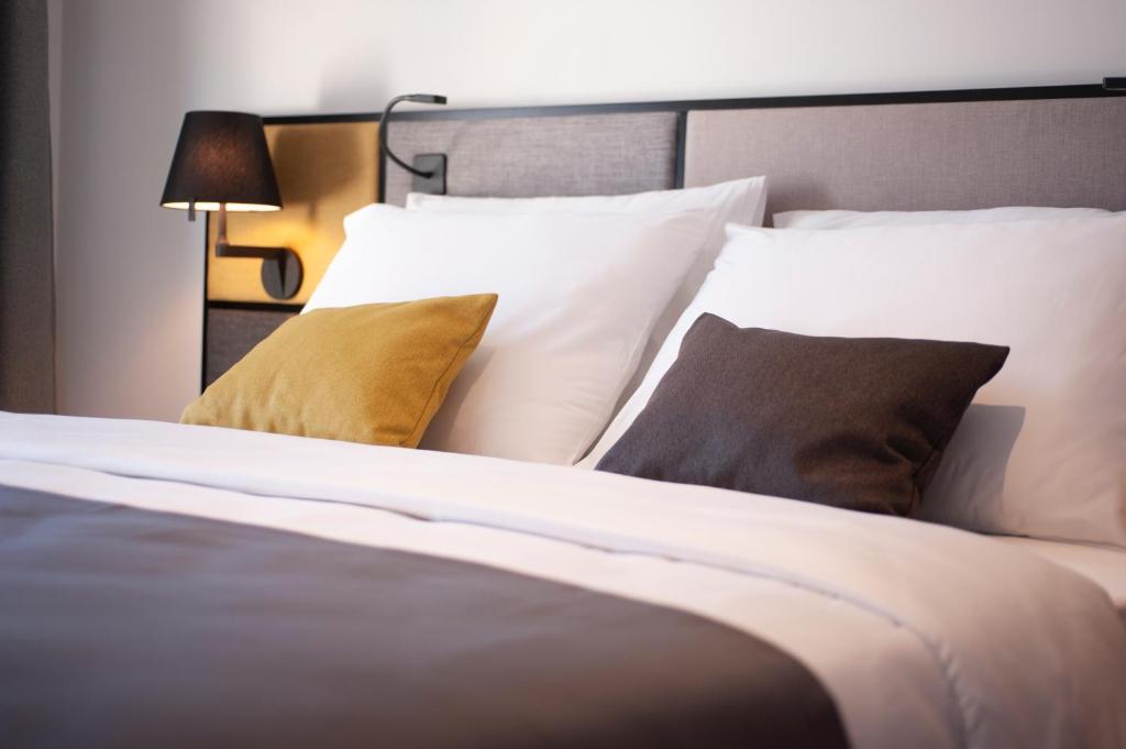 Krevet ili kreveti u jedinici u okviru objekta Fontana Hotel & Gastronomy