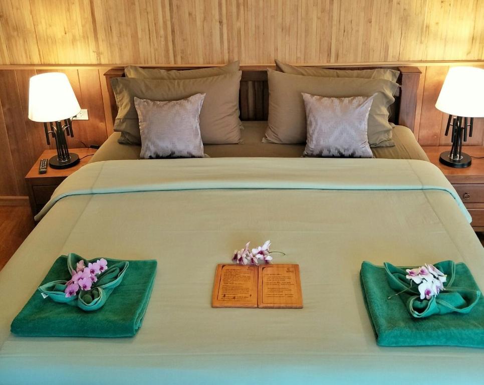 Postel nebo postele na pokoji v ubytování Koh Kood Beach Resort