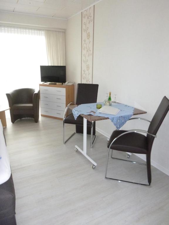 TV a/nebo společenská místnost v ubytování Haus Delphin