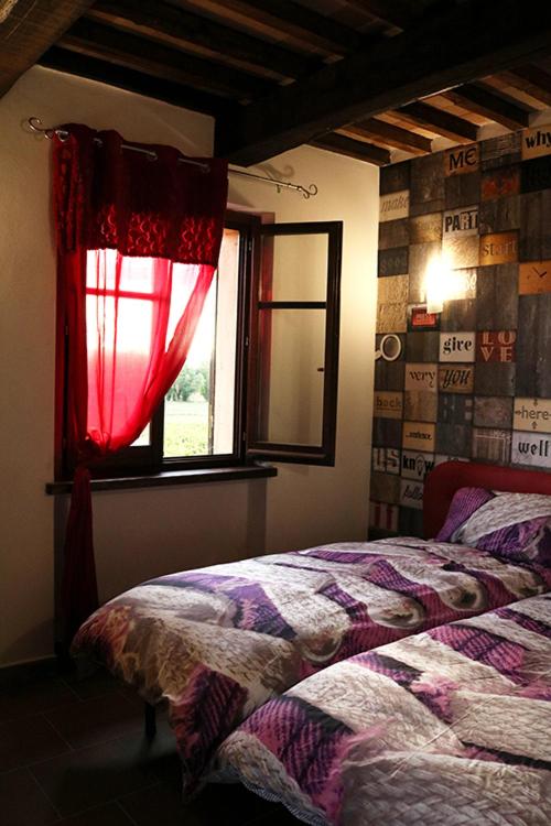Postel nebo postele na pokoji v ubytování Casale Rialto