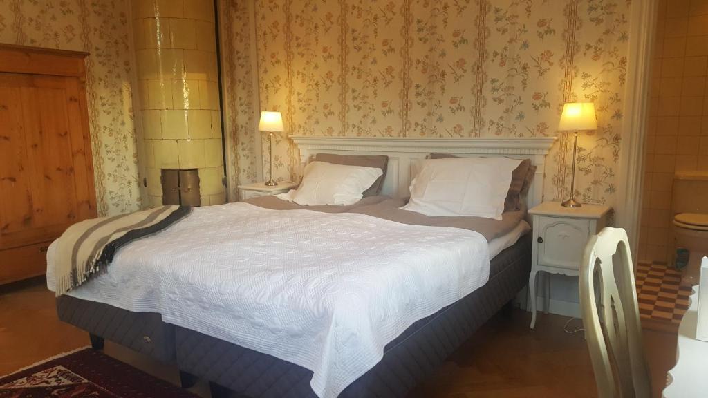 Postel nebo postele na pokoji v ubytování Hoby Gård B&B