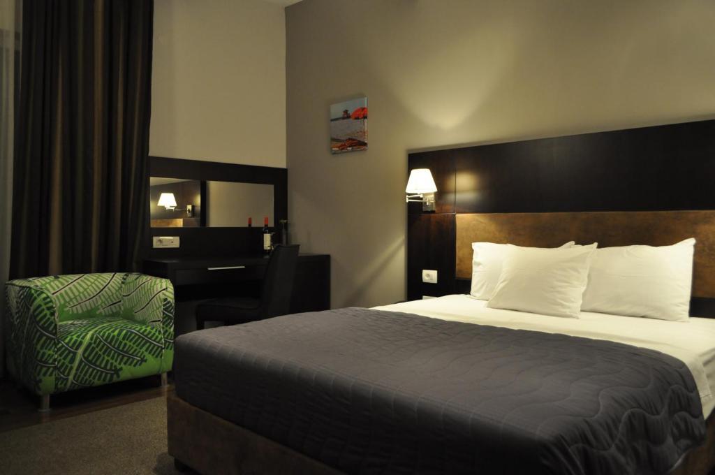 Postel nebo postele na pokoji v ubytování Hotel Dolce International