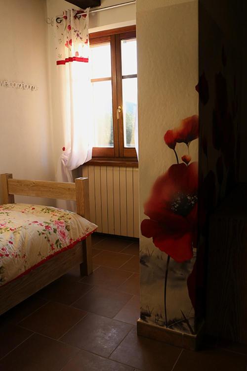 Postel nebo postele na pokoji v ubytování Casale Rialto