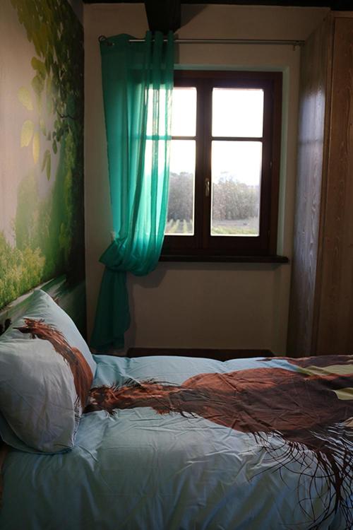 Postel nebo postele na pokoji v ubytování Casale Rialto