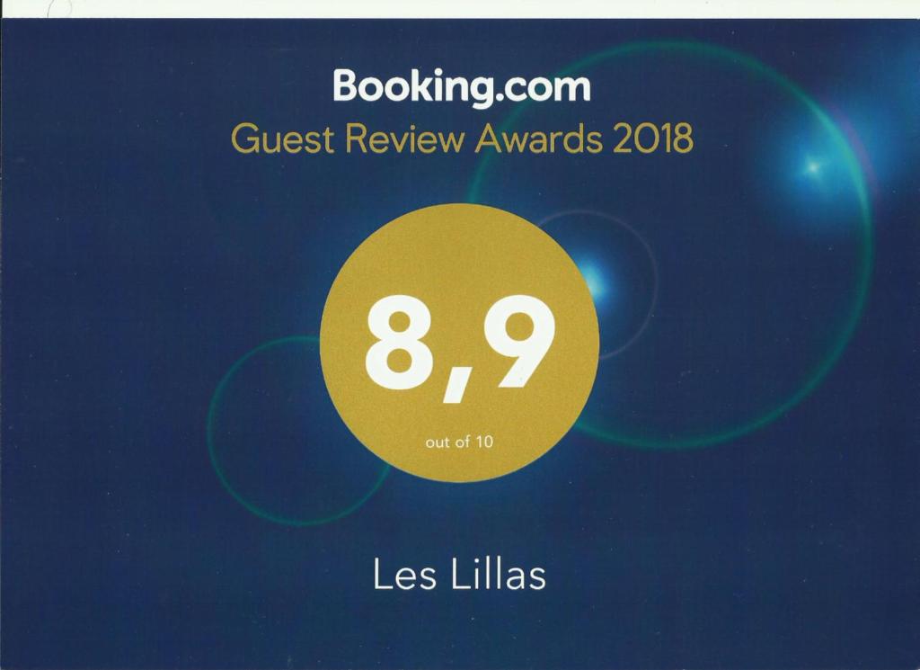 a poster with a yellow circle with the words guest review awards at Bed & Breakfast Les LILLAS in Saint-Jeannet