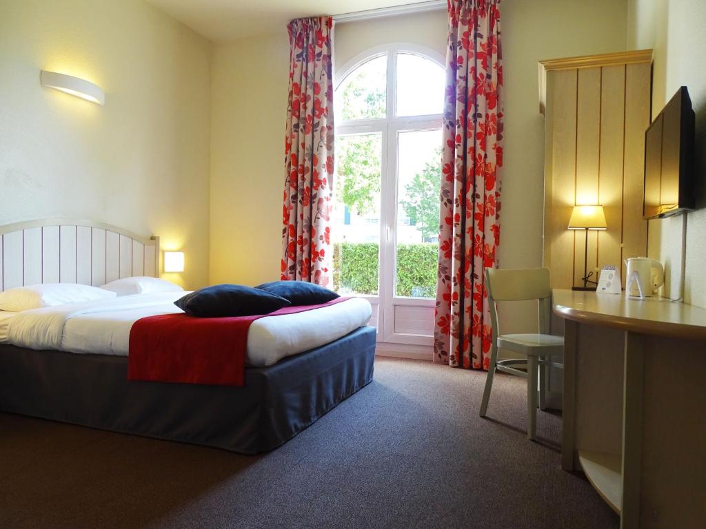 Cama o camas de una habitación en Campanile Val de France