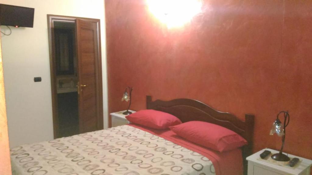 Postel nebo postele na pokoji v ubytování Dolcedorme del Pollino