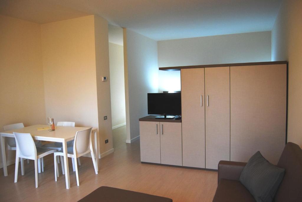 Kuchyňa alebo kuchynka v ubytovaní Residenze Al Colle Dei Pini