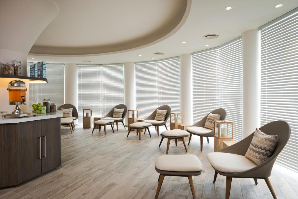Posezení v ubytování Noga by Isrotel Collection