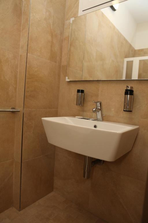 Koupelna v ubytování Hotel Parigi