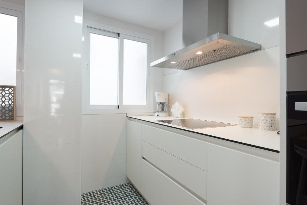 Kuchyňa alebo kuchynka v ubytovaní Centrico apartamento 2 dorm