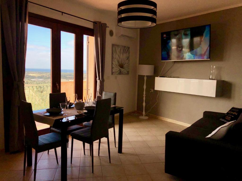 Telewizja i/lub zestaw kina domowego w obiekcie Calypso Home Sea View