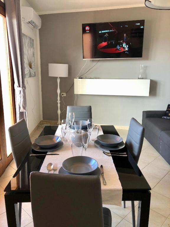 Telewizja i/lub zestaw kina domowego w obiekcie Calypso Home Sea View