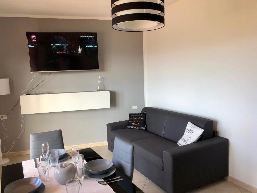 Telewizja i/lub zestaw kina domowego w obiekcie Calypso Home Sea View
