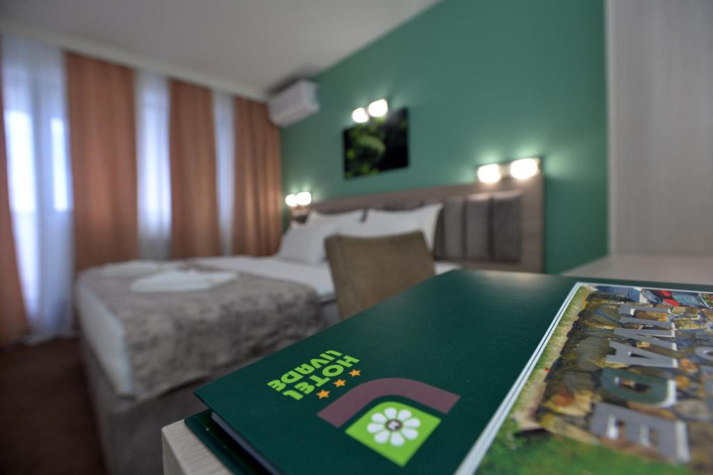 Postel nebo postele na pokoji v ubytování Hotel Livade