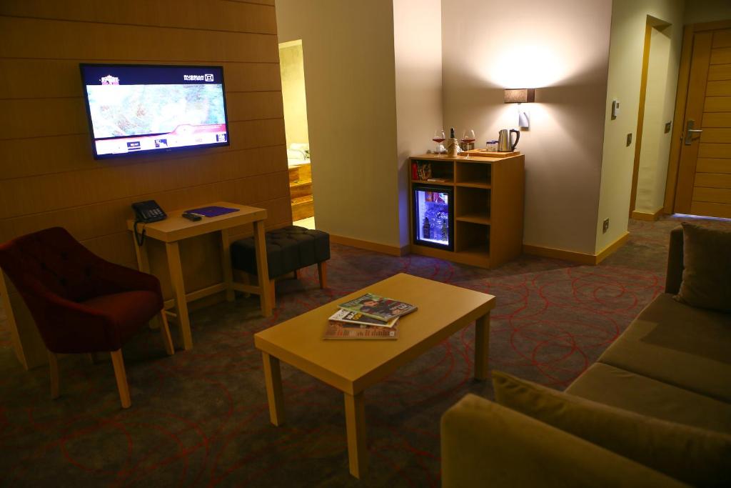 A television and/or entertainment centre at Ramada Resort by Wyndham Unye