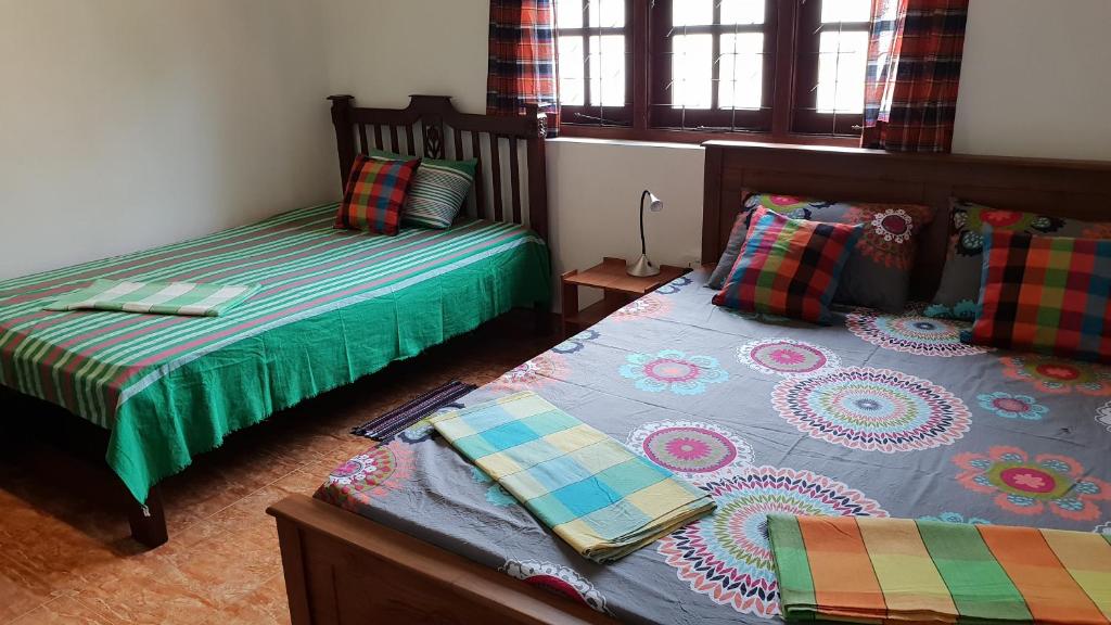 Postel nebo postele na pokoji v ubytování Emildale Villa
