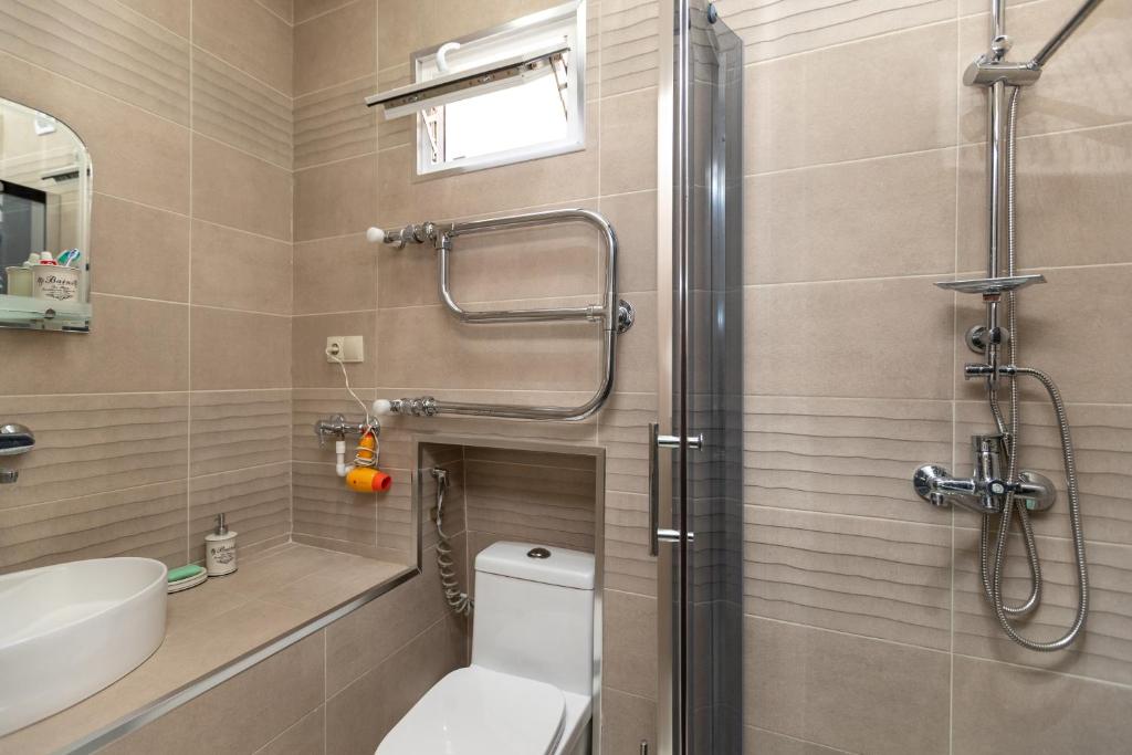 Koupelna v ubytování City Center Apartment