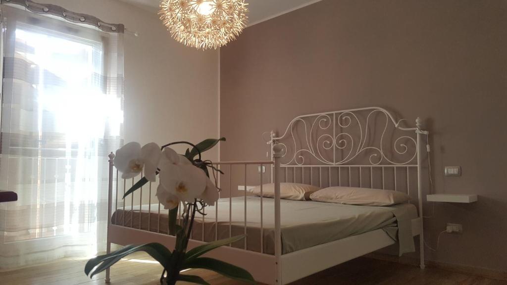 Postel nebo postele na pokoji v ubytování B&B Vivere il Mare