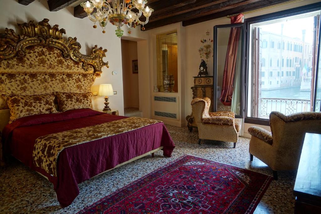 Posteľ alebo postele v izbe v ubytovaní Granda Sweet Suites