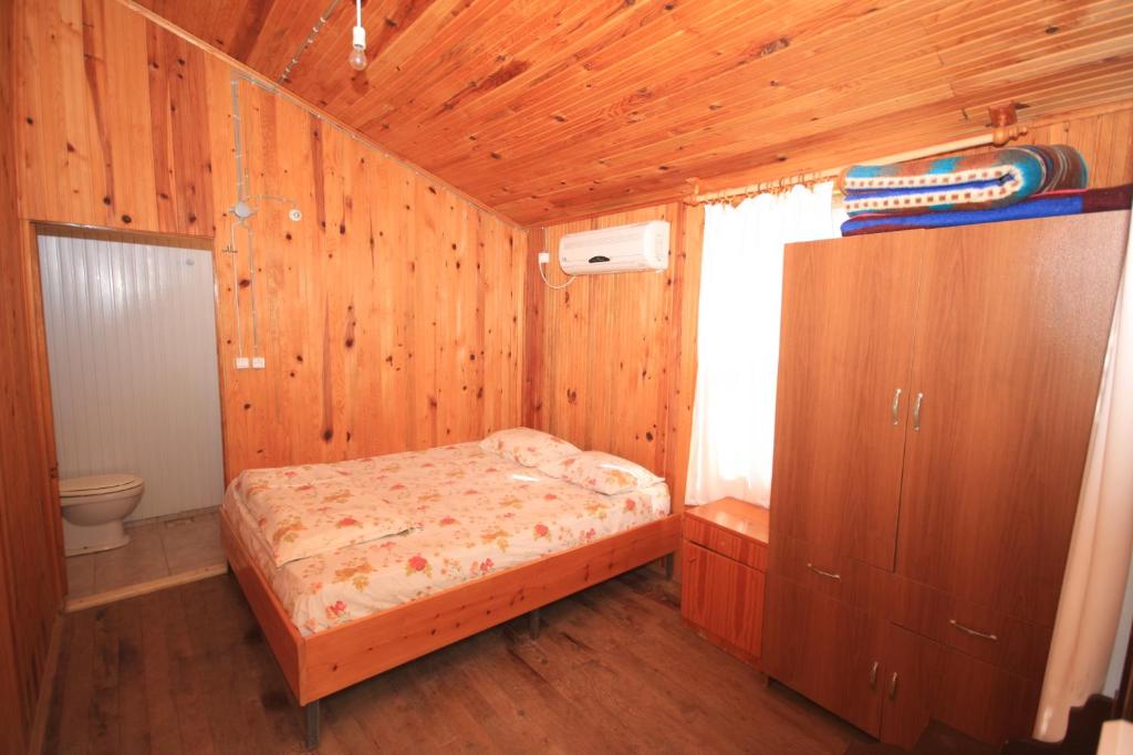 Postel nebo postele na pokoji v ubytování Olympos Varuna Bungalows & Restaurant