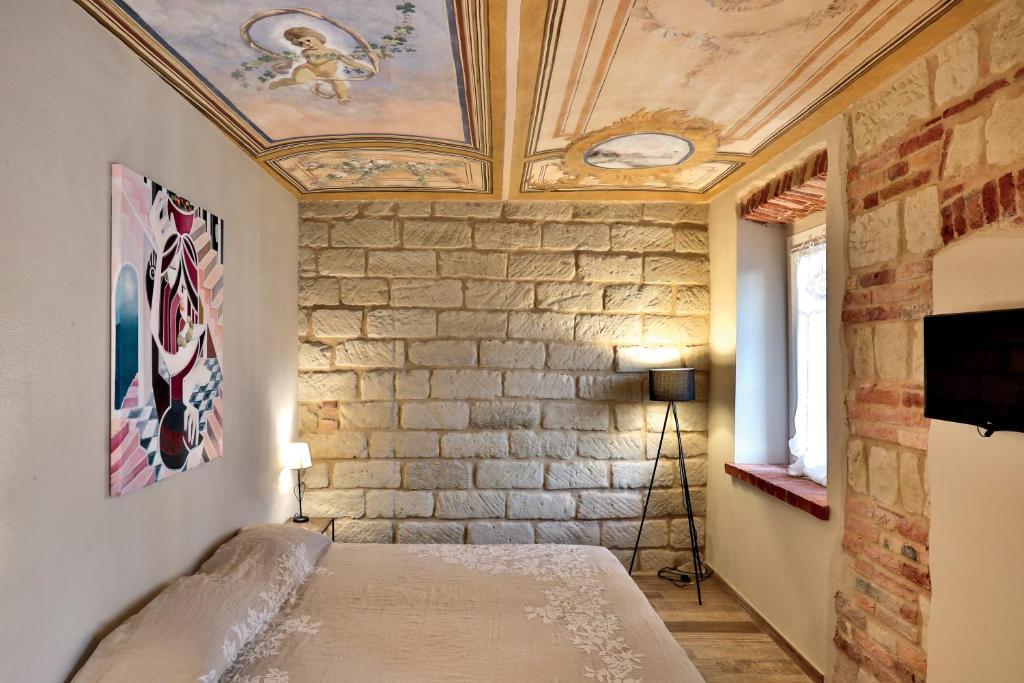 Televízia a/alebo spoločenská miestnosť v ubytovaní Country House Montessino - adults only