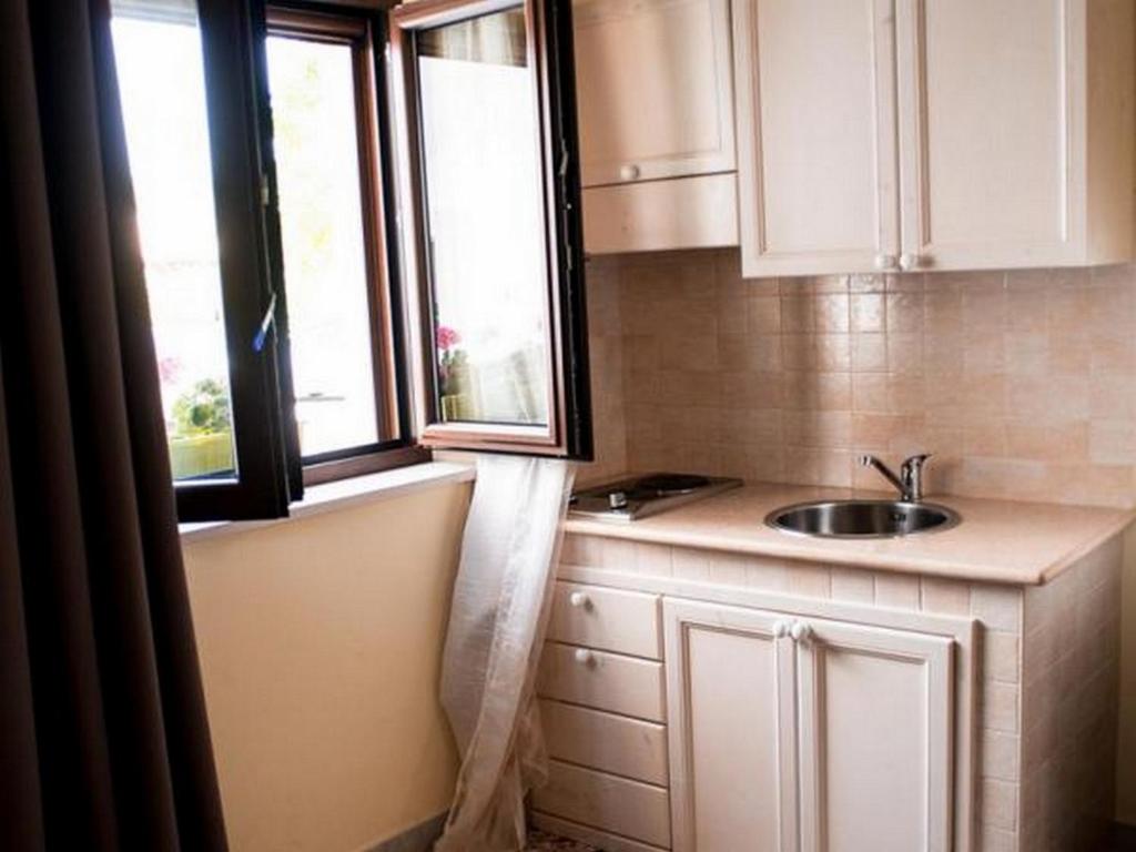 Kuchyň nebo kuchyňský kout v ubytování Masseria Lama D'impisa