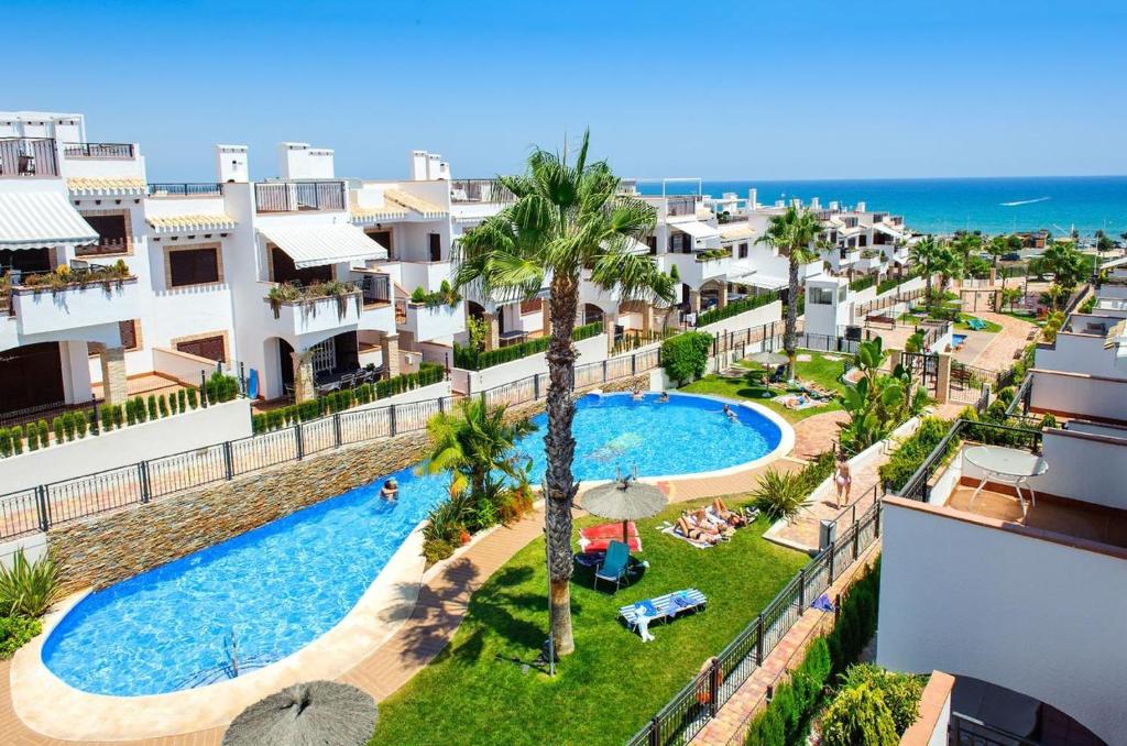 The swimming pool at or close to Apartamento Azul Beach La Mata Playa