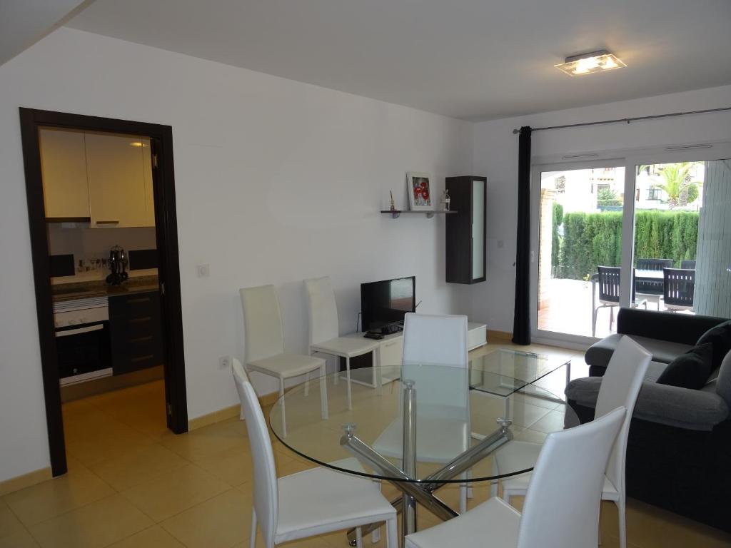 A television and/or entertainment centre at Apartamento Azul Beach La Mata Playa