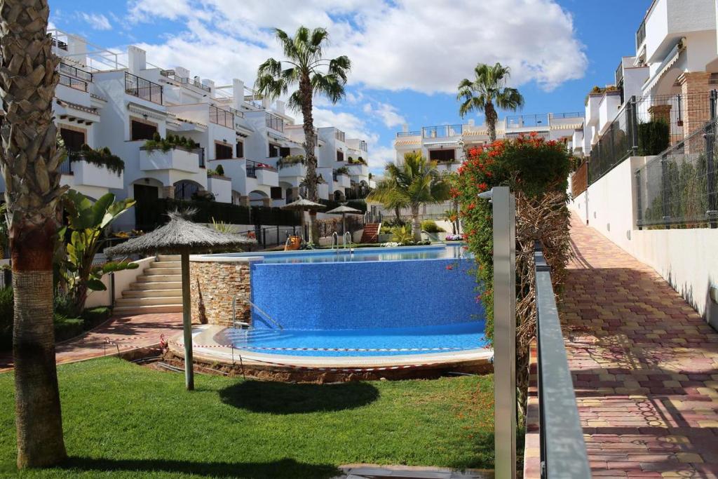 The swimming pool at or close to Apartamento Azul Beach La Mata Playa
