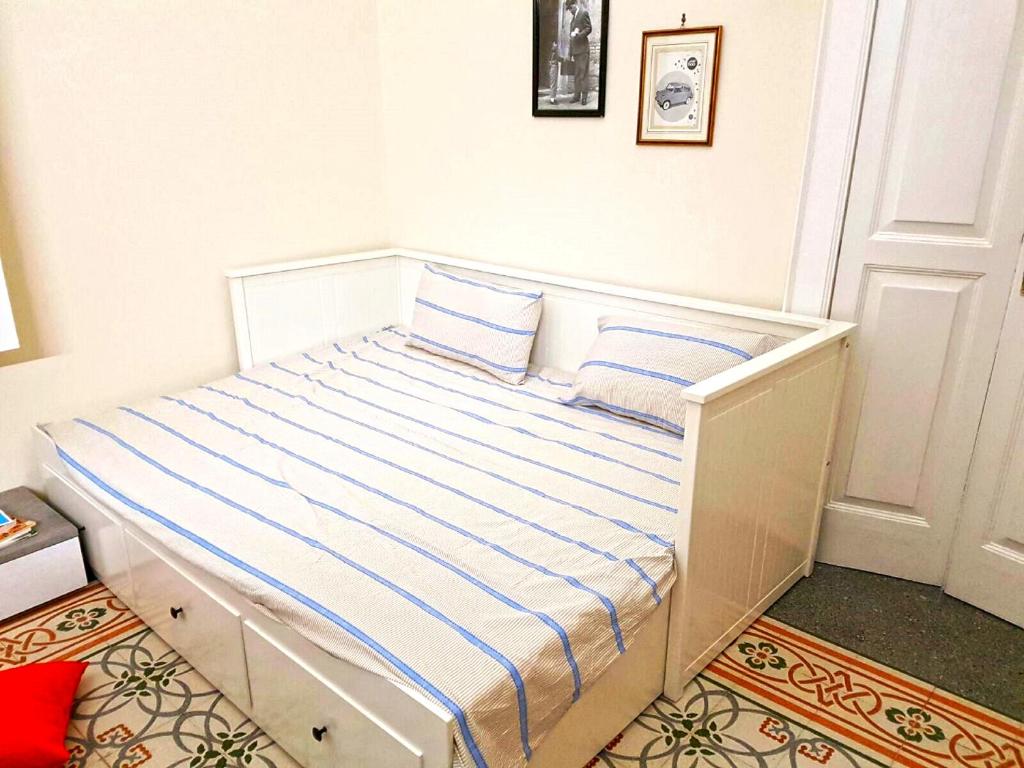 Posteľ alebo postele v izbe v ubytovaní Appartamento Manfredi