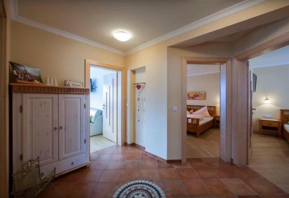 A bed or beds in a room at Appartements Zillertal Noten