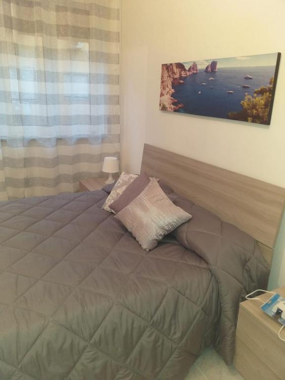 Een bed of bedden in een kamer bij B&B Belvedere