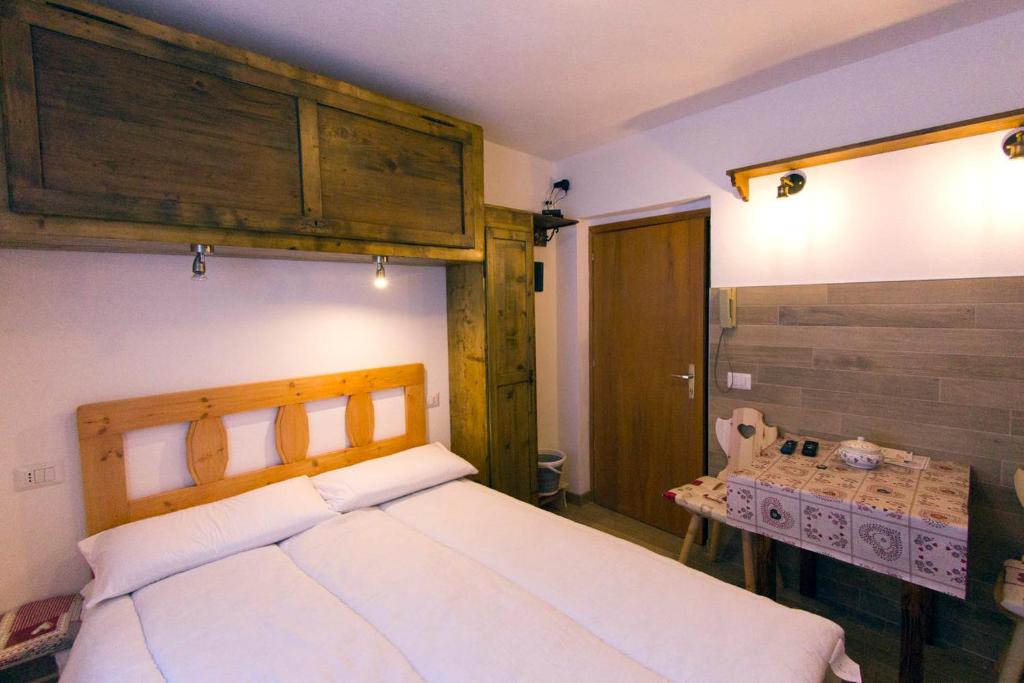 Postel nebo postele na pokoji v ubytování CasaMau Studio