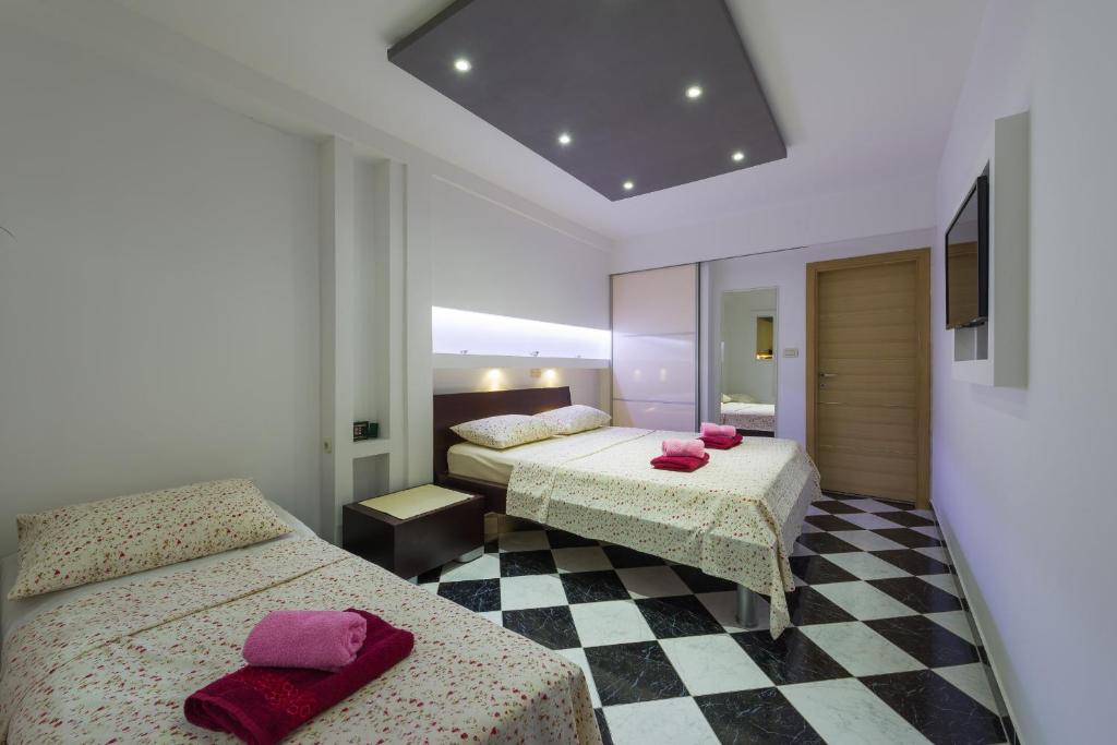 Posteľ alebo postele v izbe v ubytovaní Superb Beachfront Luxury Seaview with Private Beach