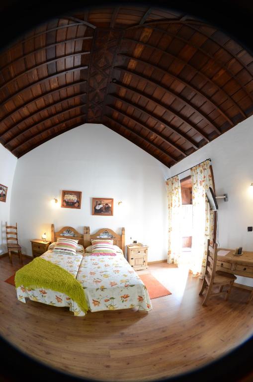 Łóżko lub łóżka w pokoju w obiekcie Hotel Rural Bentor