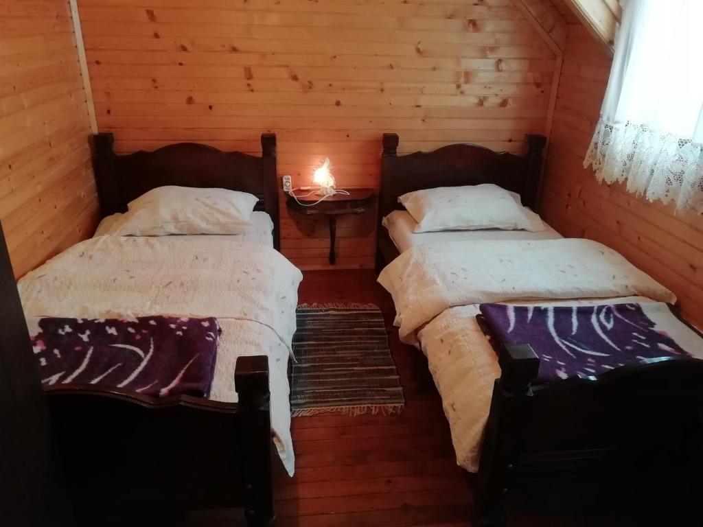 Кровать или кровати в номере Chalet Kovačević