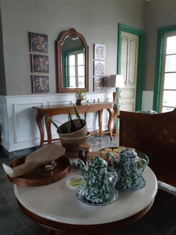 Area soggiorno di Rumah Jawa Guest House (Syariah)
