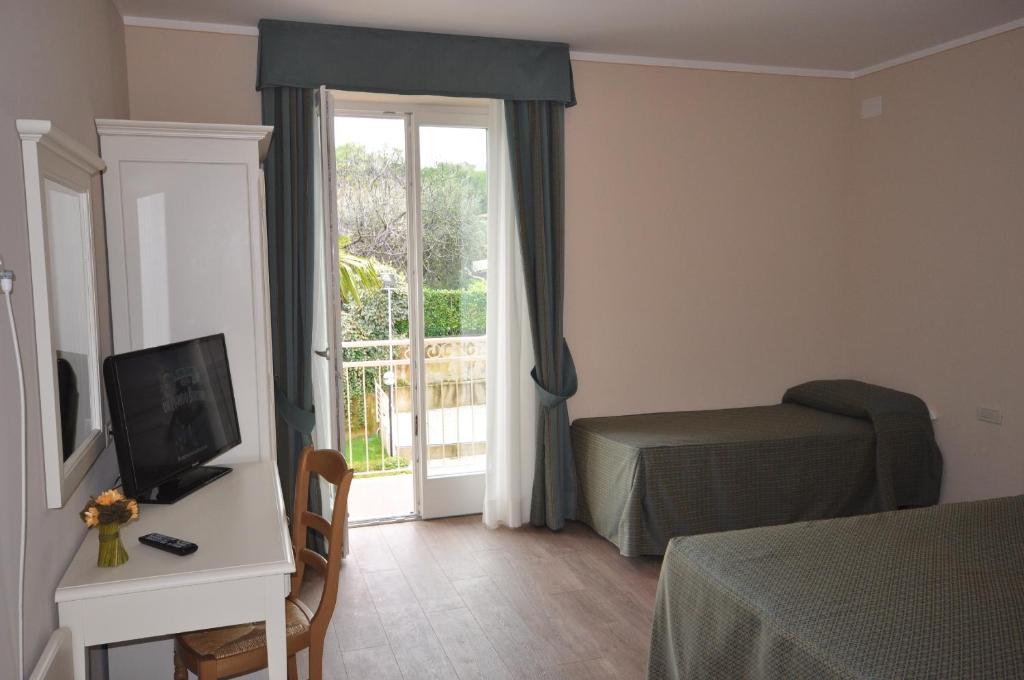 TV a/nebo společenská místnost v ubytování Hotel Panoramica