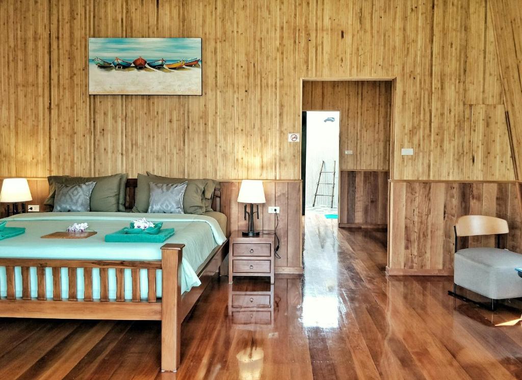 Postel nebo postele na pokoji v ubytování Koh Kood Beach Resort