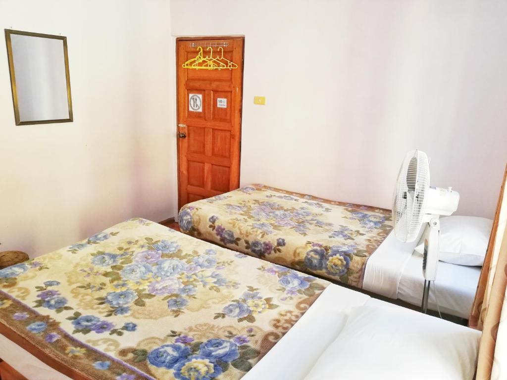 Postel nebo postele na pokoji v ubytování Gypsy Inn