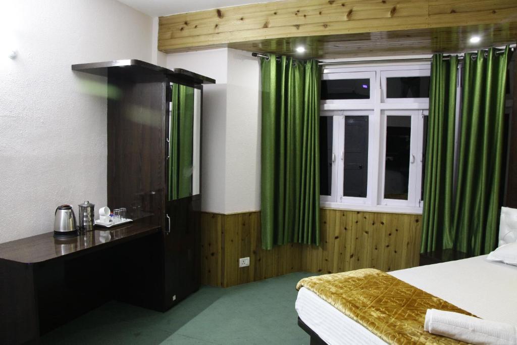 Postel nebo postele na pokoji v ubytování Hotel Paradiso