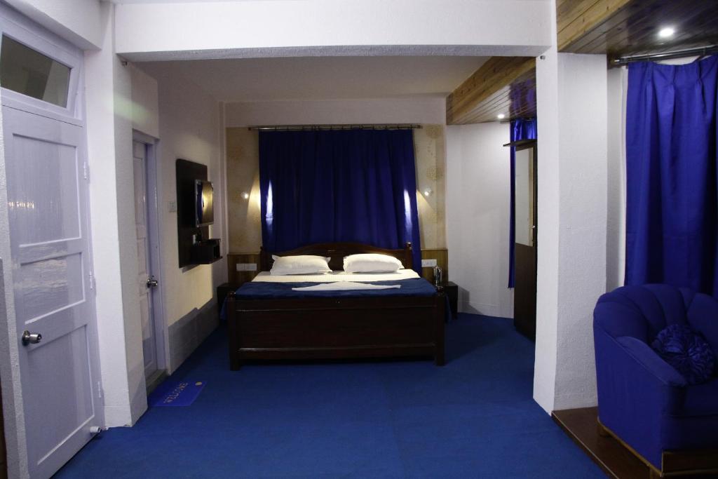 Postel nebo postele na pokoji v ubytování Hotel Paradiso